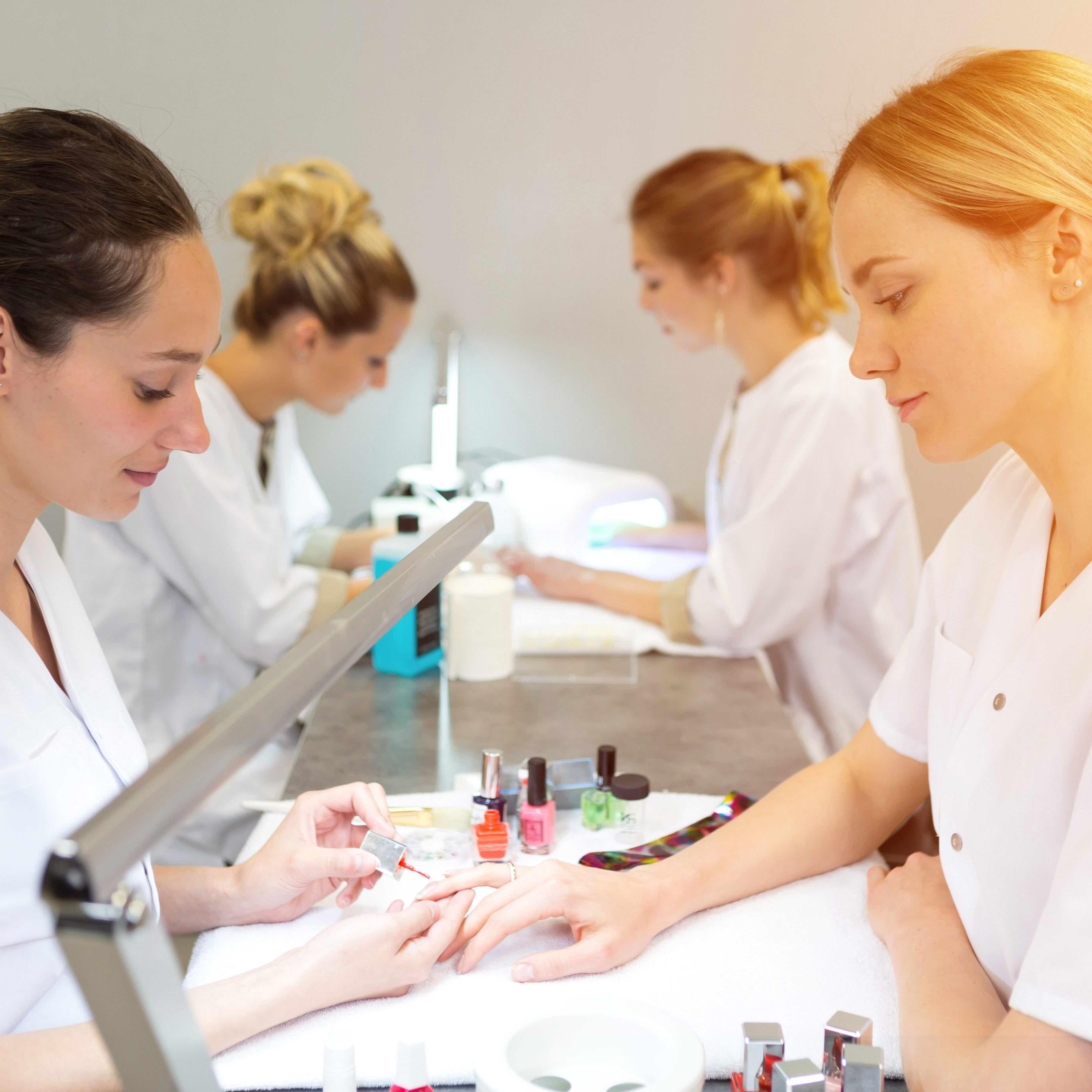 Who is responsible for the drop in students coming into the beauty industry?